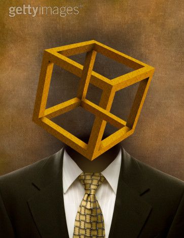 Man's suit with cube in place of head